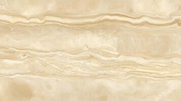 A large, curvy, gold and white stone wall. The wall is made of marble and has a very smooth texture. photo