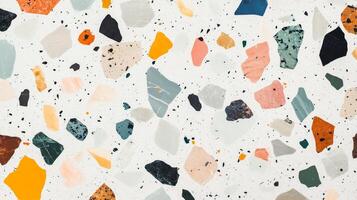 A colorful mosaic made of small rocks and pebbles. The colors are bright and vibrant, creating a lively and energetic atmosphere. photo