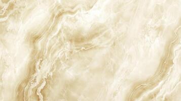 A large, curvy, gold and white stone wall. The wall is made of marble and has a very smooth texture. photo