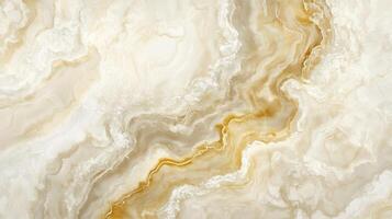 A large, curvy, gold and white stone wall. The wall is made of marble and has a very smooth texture. photo