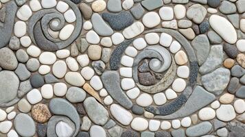 A mosaic tile pattern with a blue and white swirl design. photo