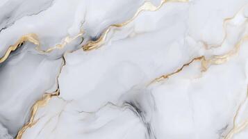 A marble wall with gold and gray swirls. The gold and gray swirls are very prominent and the marble is very shiny. photo