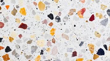 A mosaic tile floor with a variety of colored stones. The tiles are arranged in a pattern that creates a sense of depth and texture. photo