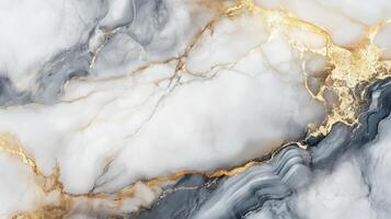 A marble wall with gold and gray swirls. The gold and gray swirls are very prominent and the marble is very shiny. photo