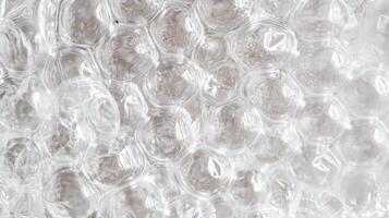 A white bubble background. The circles are very close together, and the background is very light. photo