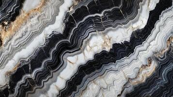 A black and white image of a marble wall with gold accents. The image has a sense of luxury and elegance. photo