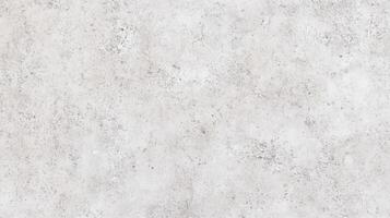 A white wall with a lot of spots and a few lines. The wall is very plain and has no decoration. photo