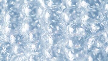 A white bubble background. The circles are very close together, and the background is very light. photo