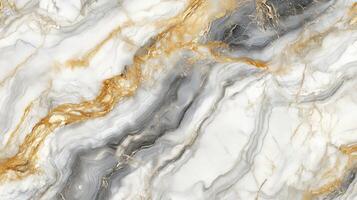 A marble wall with gold and gray swirls. The gold and gray swirls are very prominent and the marble is very shiny. photo