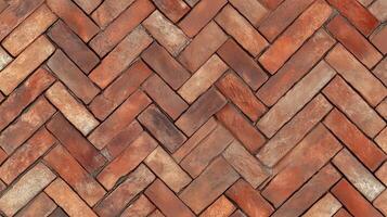 A brick wall with a zigzag pattern. The bricks are brown and the pattern is very intricate. photo