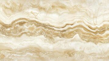 A large, curvy, gold and white stone wall. The wall is made of marble and has a very smooth texture. photo