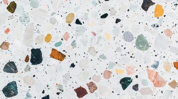 A mosaic tile floor with a variety of colored stones. The tiles are arranged in a pattern that creates a sense of depth and texture. photo