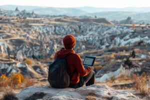 Freelancer working remotely from cappadocia turkey photo