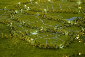 miniature of wide view of the land from above. In the center of the image, a winding river divides the landscape. photo