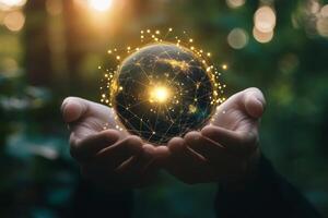 Businessman holding a glowing globe with network connections in his hands photo