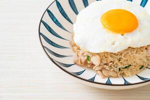 fried rice with pork and fried egg in Japanese style photo