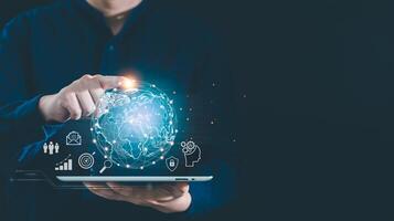 Businessman holding tablet to present global connection on social networking and customer data analytics, Business strategy and smart intelligence, digital marketing, AI Technology for global business photo