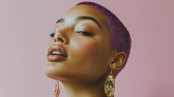 Close-up of a woman with purple buzzcut, wearing statement earrings, playful facial expression, in a minimalist studio setting with soft lighting photo