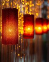 A row of glowing red lanterns hanging in soft lighting, with golden sparkles in the blurred background, creating a warm festive tone. photo