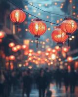 Festive red lanterns glowing above a busy street, softly lit with blurred crowds in the background, celebrating a festival photo