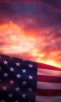 Vertical shot of the American flag, stars in focus with sunset-lit clouds in the background photo