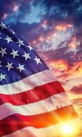 American flag flying vertically with a dramatic sunset sky in the background, vivid colors and texture details photo
