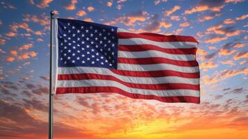 Detailed shot of the American flag with stars and stripes, fading sunset sky in the distance photo