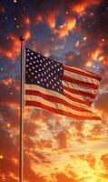 Zoomed-in vertical shot of the American flag with stars, background of a sunset sky photo