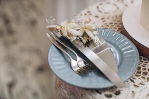 Wedding decor, serving, plate with fork and knife, cutting wedding cake, bride and groom photo