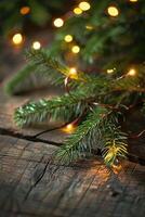 Evergreen Branch with String Lights on Rustic Wooden Surface photo