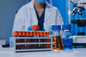 Scientist using microscope in laboratory. Close-up of a researcher's hands adjusting a modern microscope in a lab setting. Science concept photo