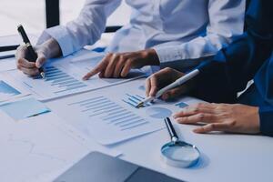 Fund managers team consultation and discuss about analysis Investment stock market at office photo