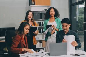 Stress, business people and employee frustrated with multitasking, pressure or overworked by team in chaos with paperwork. Anxiety, headache and worker overwhelmed by group and burnout in crisis photo
