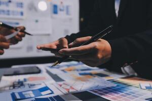 The designer team is designing the uxui system to make the uxui system work well on new phones and support system updates. Website development concept UI UX front end designer photo