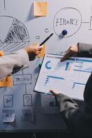 Business people are analyzing and planning business strategies. photo
