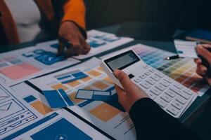 The designer team is designing the uxui system to make the uxui system work well on new phones and support system updates. Website development concept UI UX front end designer photo