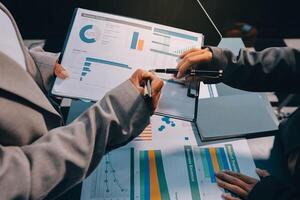 Team of business people are meeting to analyze data for marketing plan,Market research reports and income statistics, Financial and Accounting concept. photo