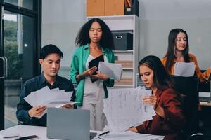 Stress, business people and employee frustrated with multitasking, pressure or overworked by team in chaos with paperwork. Anxiety, headache and worker overwhelmed by group and burnout in crisis photo