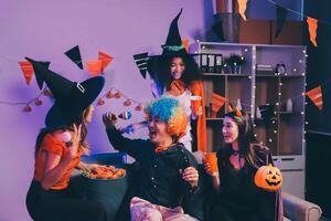Joyful office Halloween party with coworkers in costumes, celebrating with drinks and laughter, fostering teamwork and festive spirit photo
