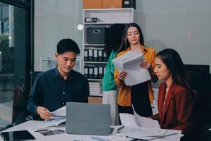 Stress, business people and employee frustrated with multitasking, pressure or overworked by team in chaos with paperwork. Anxiety, headache and worker overwhelmed by group and burnout in crisis photo