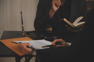 Law theme, gavel or mallet of the judge, lawyer enforcement officers, evidence-based cases taken into account in the court abount business, legislation. photo