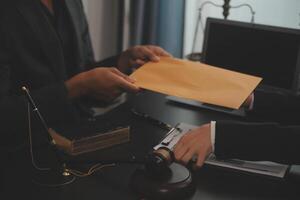 Law theme, gavel or mallet of the judge, lawyer enforcement officers, evidence-based cases taken into account in the court abount business, legislation. photo