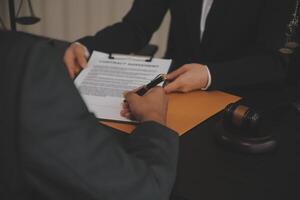 Law theme, gavel or mallet of the judge, lawyer enforcement officers, evidence-based cases taken into account in the court abount business, legislation. photo