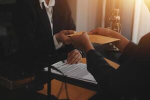 Law theme, gavel or mallet of the judge, lawyer enforcement officers, evidence-based cases taken into account in the court abount business, legislation. photo