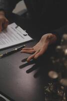 Law theme, gavel or mallet of the judge, lawyer enforcement officers, evidence-based cases taken into account in the court abount business, legislation. photo
