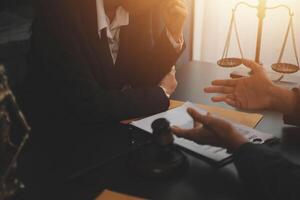Law theme, gavel or mallet of the judge, lawyer enforcement officers, evidence-based cases taken into account in the court abount business, legislation. photo