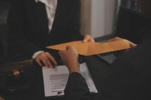 Law theme, gavel or mallet of the judge, lawyer enforcement officers, evidence-based cases taken into account in the court abount business, legislation. photo