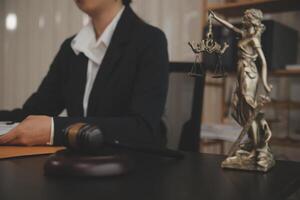 Law theme, gavel or mallet of the judge, lawyer enforcement officers, evidence-based cases taken into account in the court abount business, legislation. photo