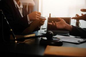 Law theme, gavel or mallet of the judge, lawyer enforcement officers, evidence-based cases taken into account in the court abount business, legislation. photo