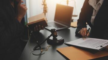 Law theme, gavel or mallet of the judge, lawyer enforcement officers, evidence-based cases taken into account in the court abount business, legislation. photo